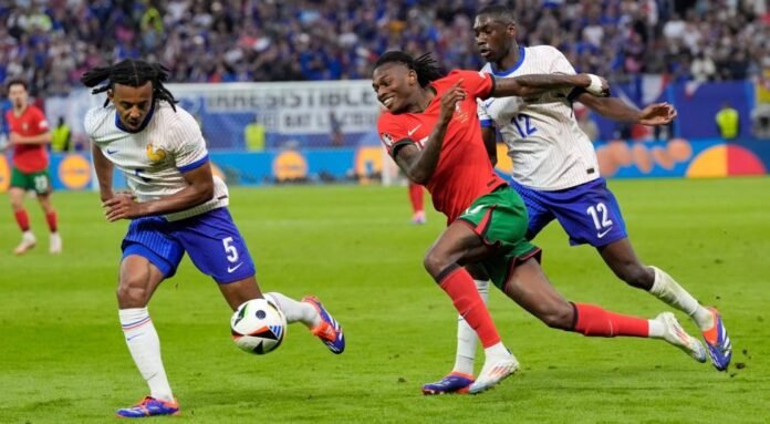 France Edges Portugal